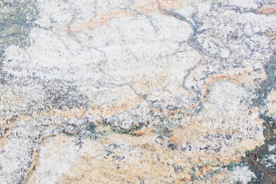 Veined natural stone surface